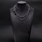 collier pour homme avec des chaines en argent noir et diamants noirs