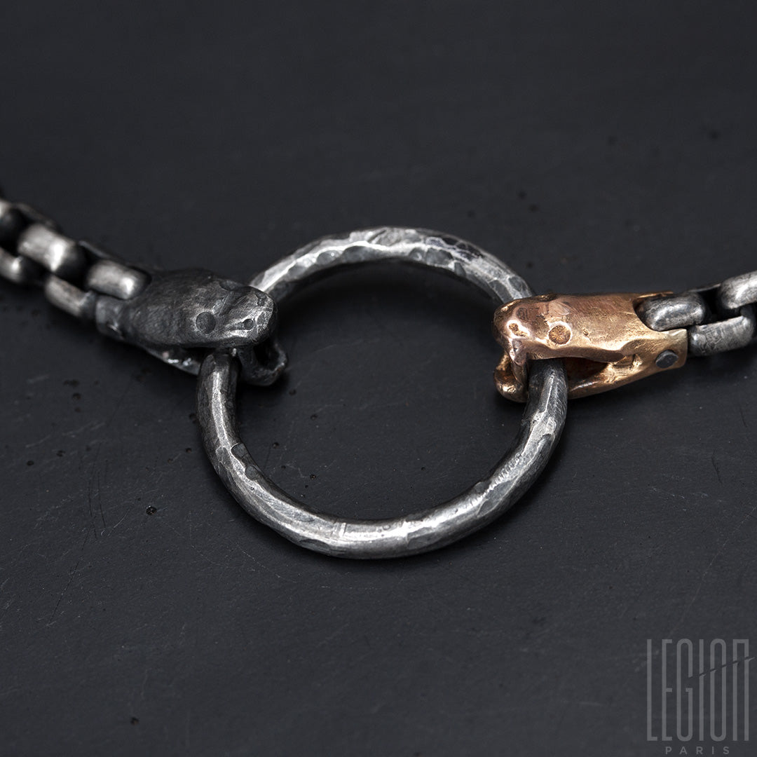 bracelet double tours en argent noir et or rouge, chaine venitienne et deux têtes de serpents.