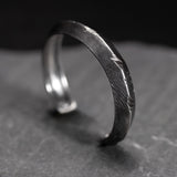 bracelet rigide ouvert pour femme en argent noir avec des diamants gris