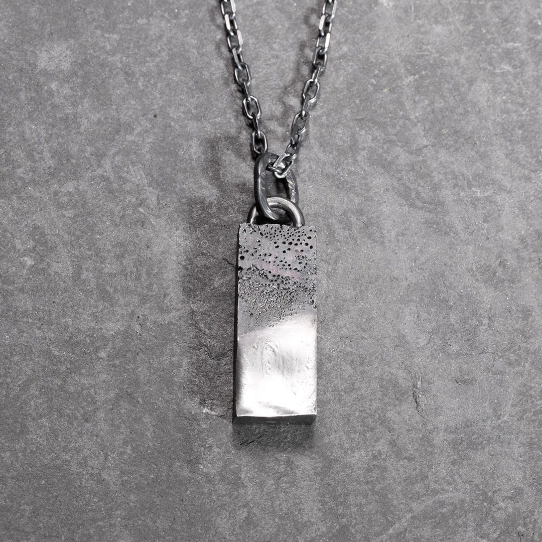 X DECIMA PENDENTIF EN ARGENT