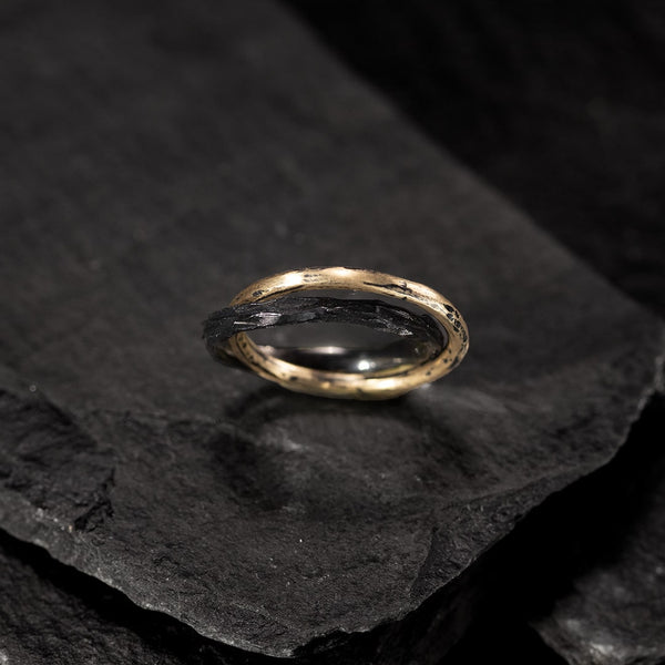 double ring in yellow gold and ultra-black silver