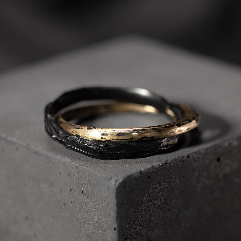 double ring in yellow gold and ultra-black silver