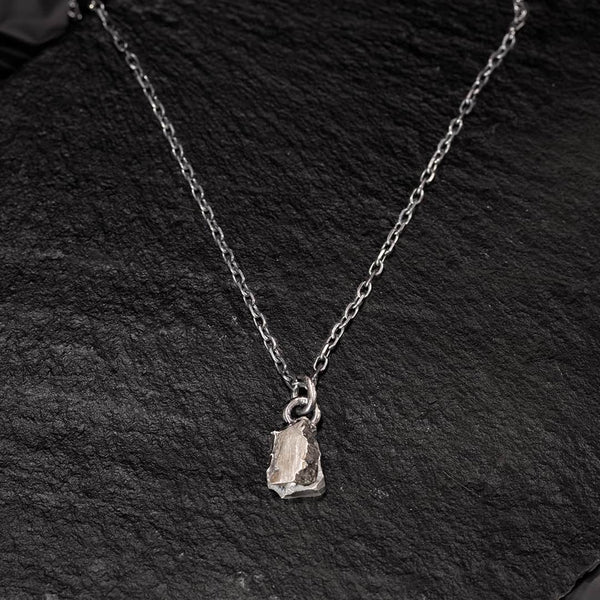 silver and meteorite pendant