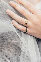 double ring in yellow gold and ultra-black silver