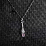 Pendentif en argent noir avec une tourmaline rose grise brute