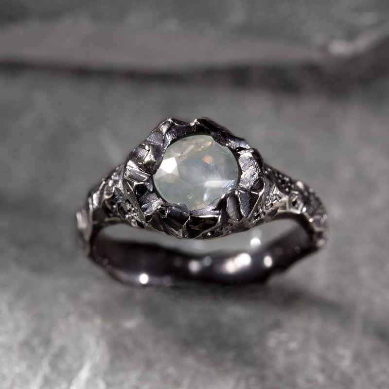 white gold and opalescent sapphire ring