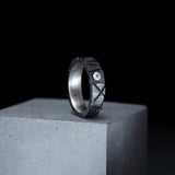 textured black silver ring with grey diamond