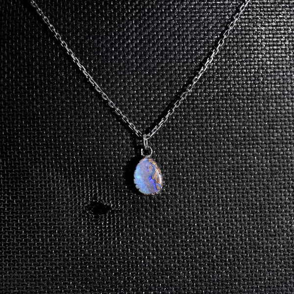 silver pendant with blue opal