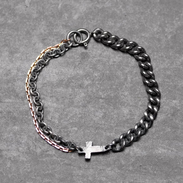 bracelet for men in black silver and rose gold with a cross