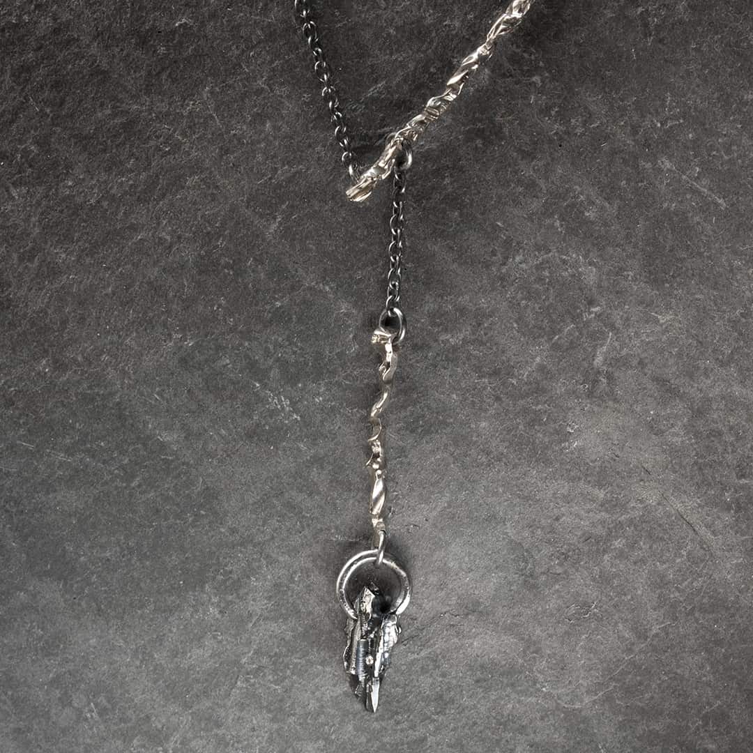 collier mobile en argent et or blanc